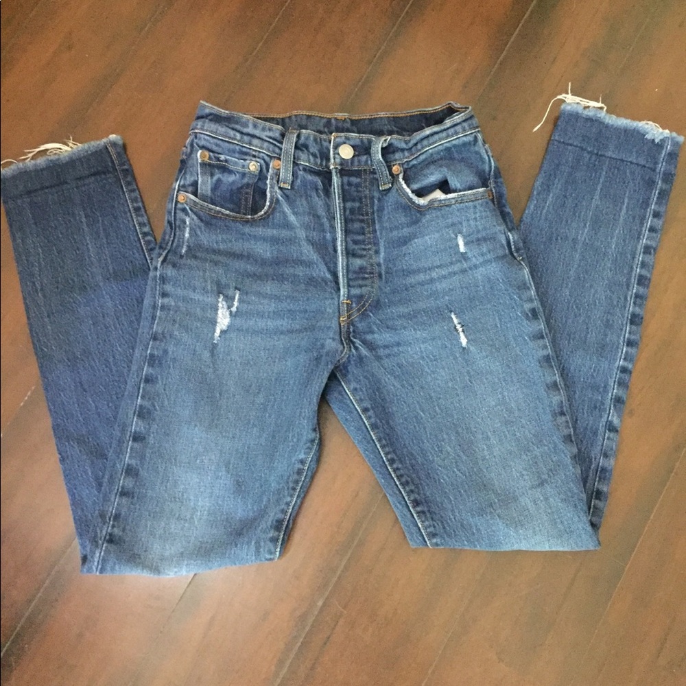 Slightly distressed Levi’s high waisted jeans